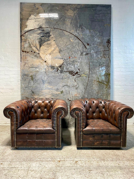 Matching Pair of MidC Leather Chesterfield Club Chairs